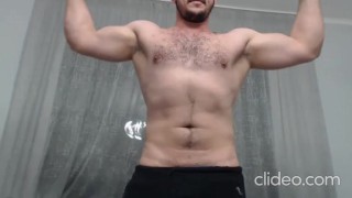 Strong alpha guy flexing on cam