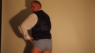 Kudoslong in a shirt and waistcoat strips and wanks his shaved uncut cock