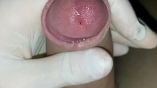 Quick handjob with latex gloves