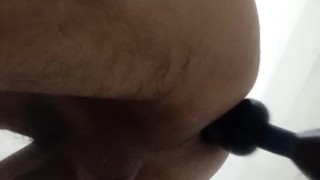 Kneading my ass with an anal plug in different poses.