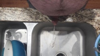 Peeing in mother laws sink