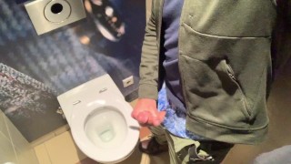 Jerking off in the train station toilet
