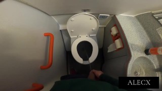 JERKING OFF AND CUMMING ON THE PLANE