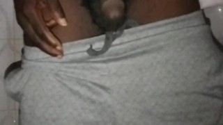 This young black stud is pissing handsfree wow... Dablackpee