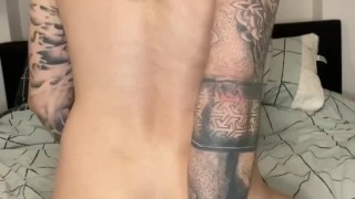 Tattooed guy rides dildo