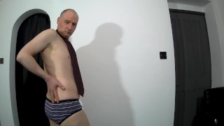 Kudoslong posing in a neck tie and striped y-fronts wanks his shaved cock