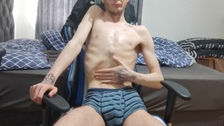 Extremely skinny teen oils up his body and shows his features