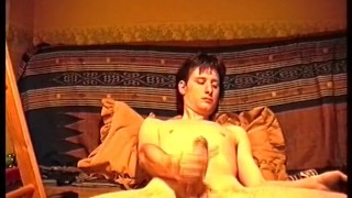 Twink Kudoslong at 19 strips and wanks as he looks at a porn mag