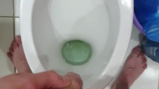 Pissing in toilet 