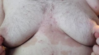 chubby plays with his fat tits