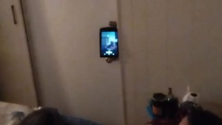 White cute milf in night dress smoking and watching TV