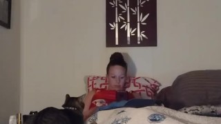White milf smoking while watching videos on her phone