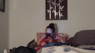 White milf smoking while watching videos on her phone