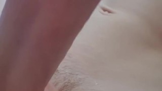 Teen playing with his big dick while bathing