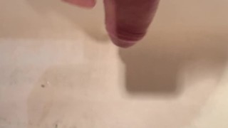 The guy in the bathroom jerked off his fat dick and cummed