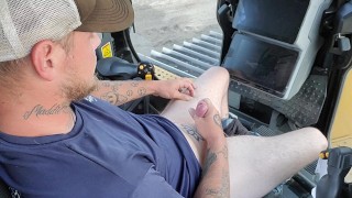 Risky public masturbation in the dozer at work