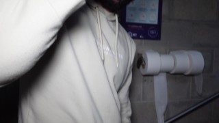 Hung Stud Wanks in Gray Sweat Pants in Public Toilet