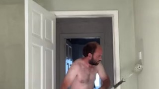 Hairy tubby exhibitionist guy working naked