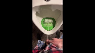 Pissing into a urinal in a pub. I play football with urine