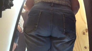 BBW MILF trying on shorts in fitting room.