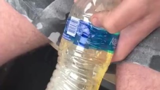 Friend took a piss in a bottle in car. 