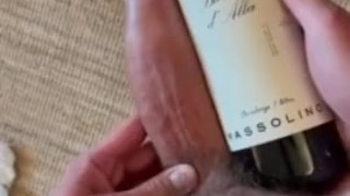Comparing my big cock to a wine bottle