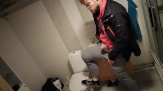 Muscular young bull with huge muscular thighs masturbating after a sweaty session at the gym