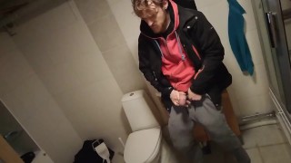 Muscular young bull with huge muscular thighs masturbating after a sweaty session at the gym