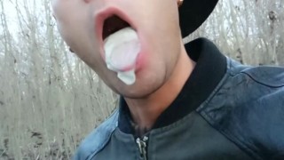 Twink uses cum filled condom after fuck like bubble gum and puts on a condom on his tongue
