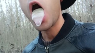 Twink uses cum filled condom after fuck like bubble gum and puts on a condom on his tongue