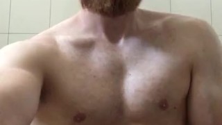Bearded ginger muscle guy wank his cock