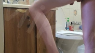 Hot Skinny Twink Fucks himself with big dildo in bathroom