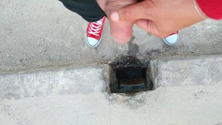 Uncut cock piss on a bridge through hole