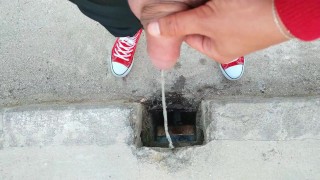 Uncut cock piss on a bridge through hole