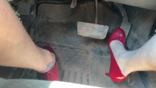 Red high heels out for a drive