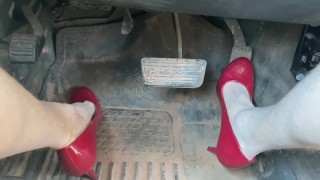 Red high heels out for a drive