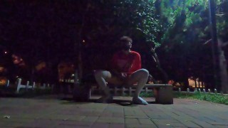 Boys in white stockings masturbate and ejaculate in the park, many passersby are watching