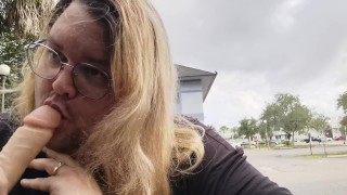 Slave Sucks Dildo in Public Parking Lot!