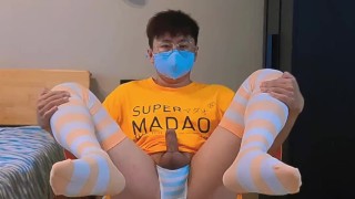 Boy in yellow t-shirt and stockings masturbates and cums at home