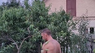 After a hot day, I water the garden