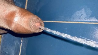 Good clear piss game on the bathroom floor 