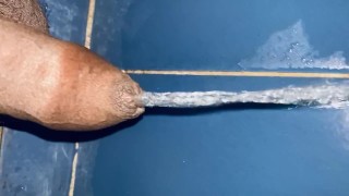 Good clear piss game on the bathroom floor 