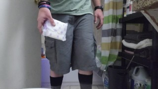 Sissy Nonbinary husband putting an Always Maxi size 5 pad panty liner in his red panties