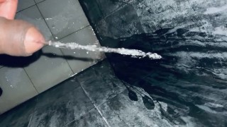Uncut dick pissing at the dirty gym bathroom while working out 