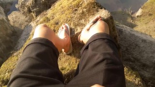 Boy cumming on his feet in flip flops after wanking outdoors. Foot fetish video