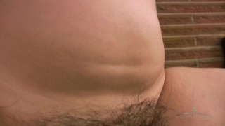 Brunette cutie Ami strips while working out and spreads her hairy holes wide open