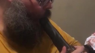 Okuma sucking on long dildo
