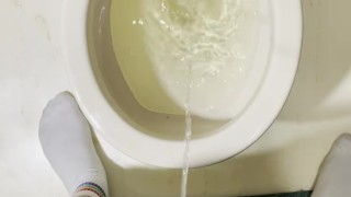 Straight teen takes a long piss