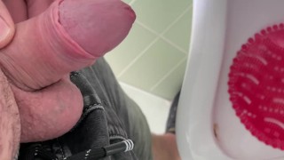 Public toilet - little penis piss into urinal