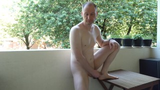 Kudoslong on the balcony undressing naked his cock semi-erect he wanks till erect and gets dressed
